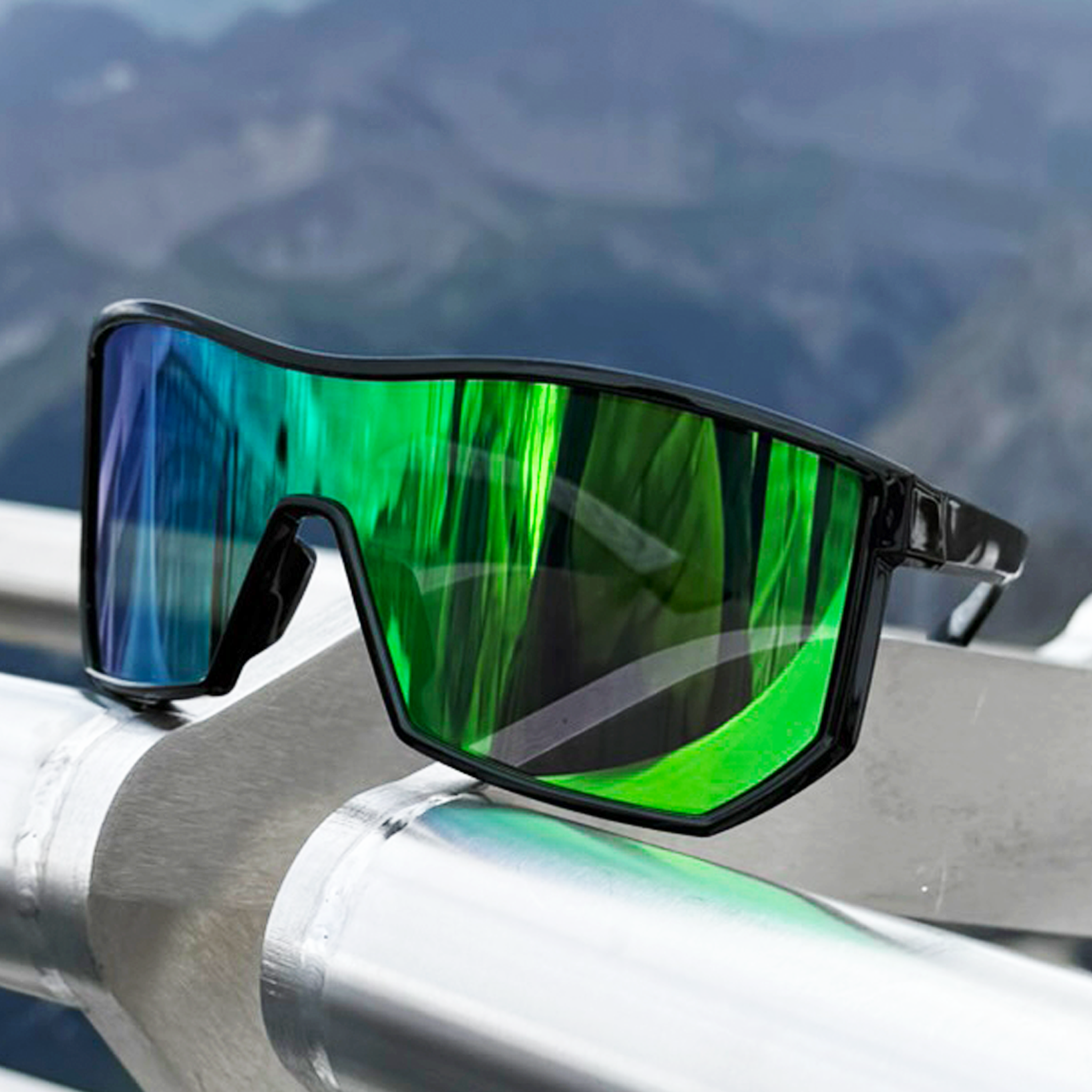 E3 Optics E4 Series sunglasses with bold green mirror lenses and a sleek black frame, designed for athletics and outdoor activities.