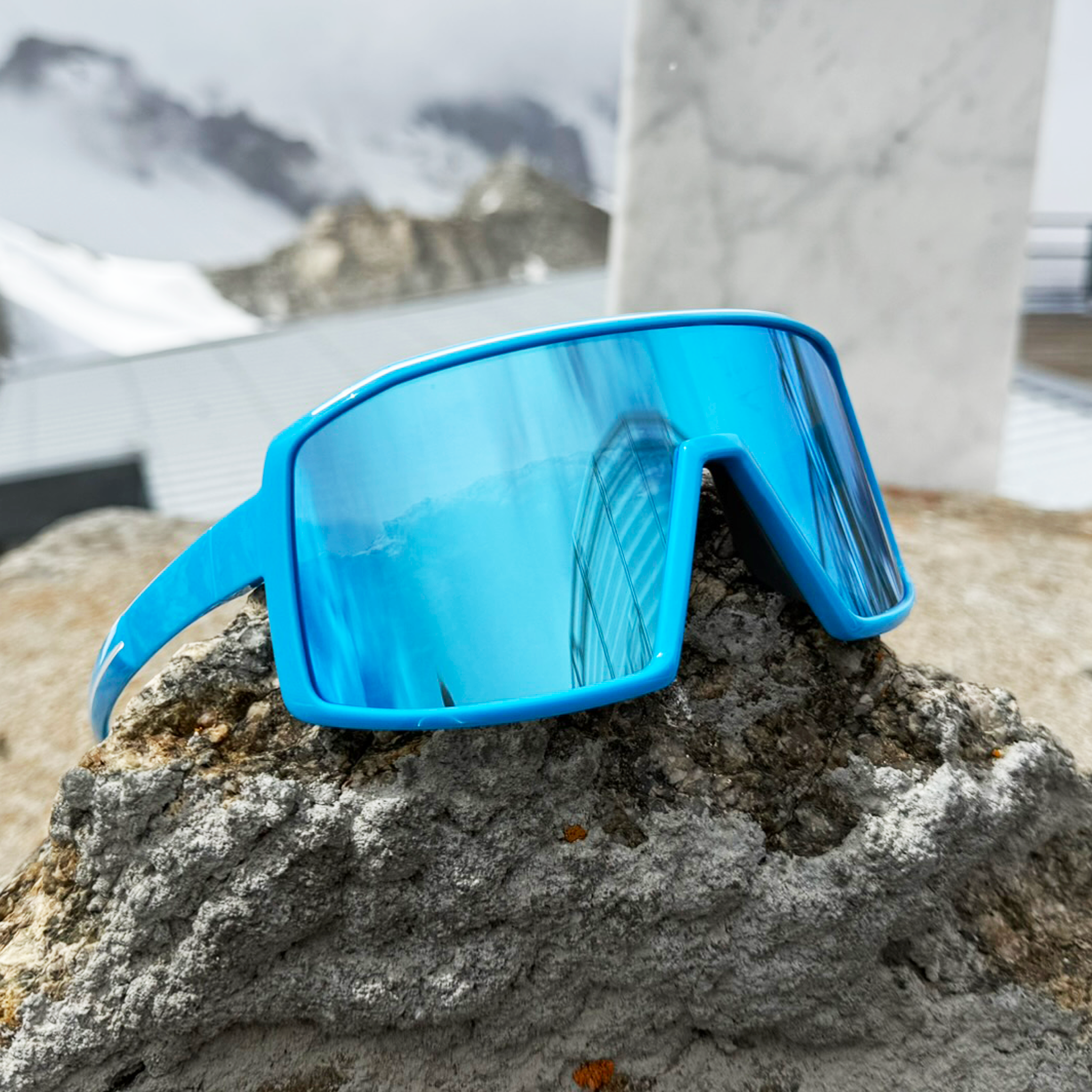 E3 Optics E11 precise lens sunglasses outdoors at Mont Blanc – performance eyewear with impact resistant protection.