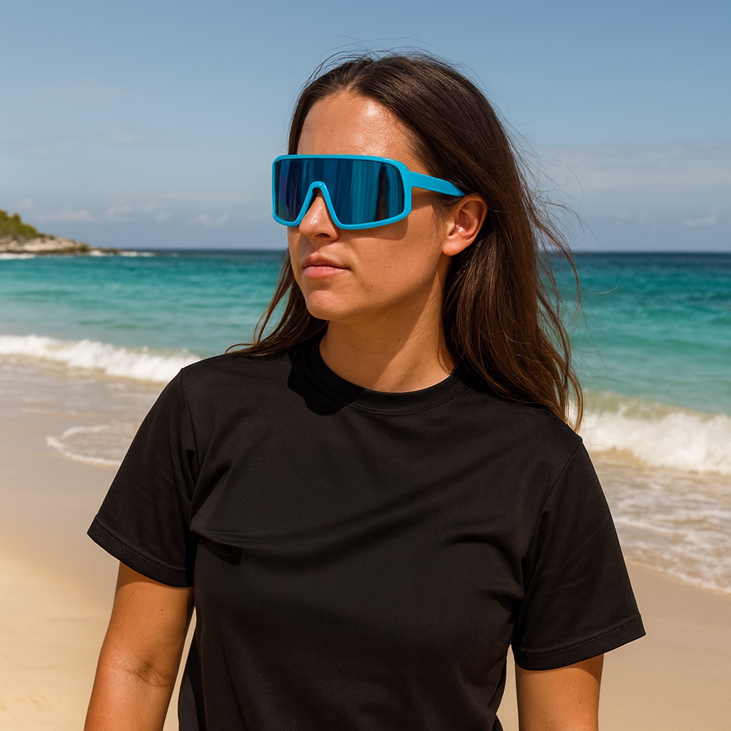 Female beachside with E3 Optics E11 precise lens sunglasses – impact resistant beach and outdoor eyewear.