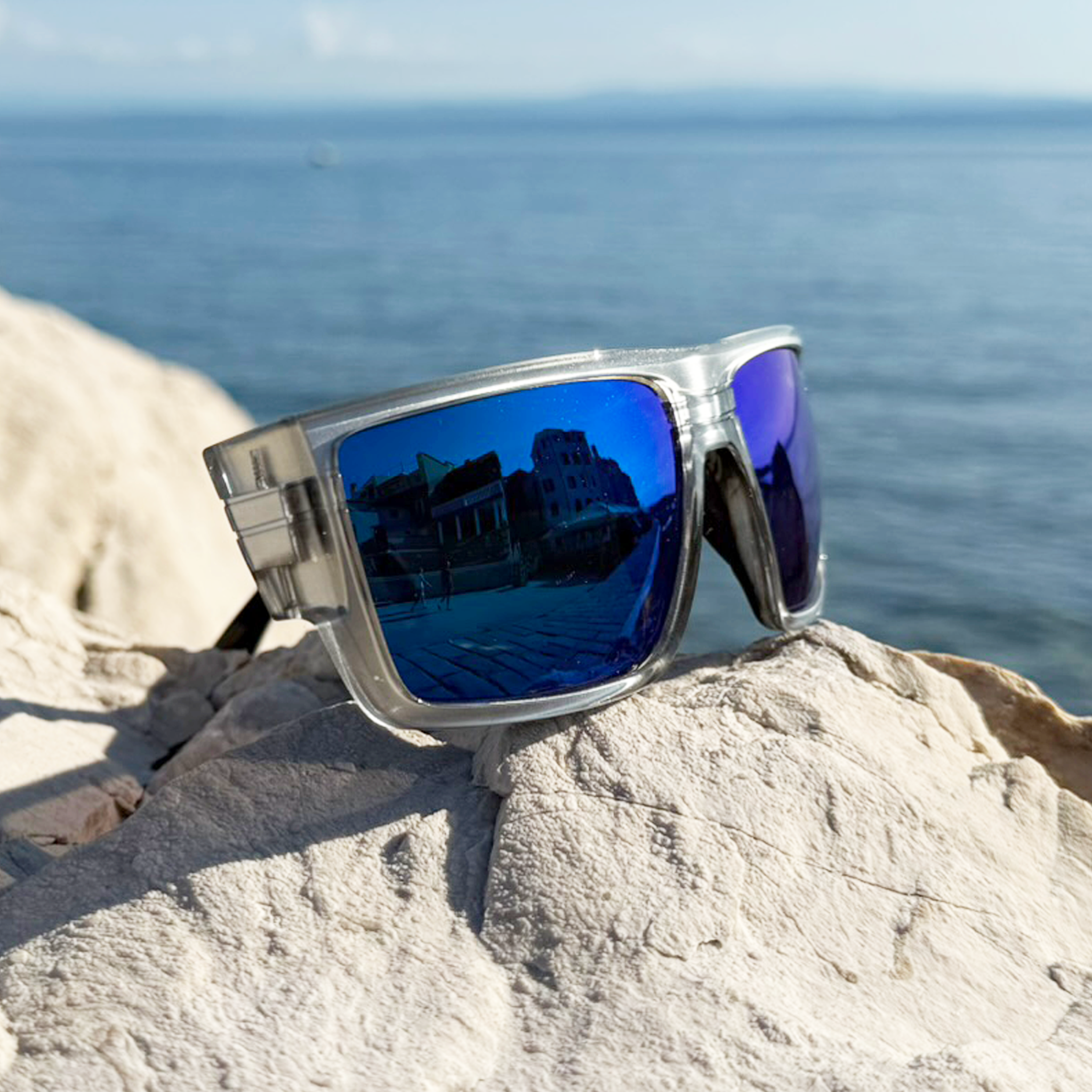 E3 Optics E18 floating polarized sunglasses by the seaside perfect for boating and paddleboarding