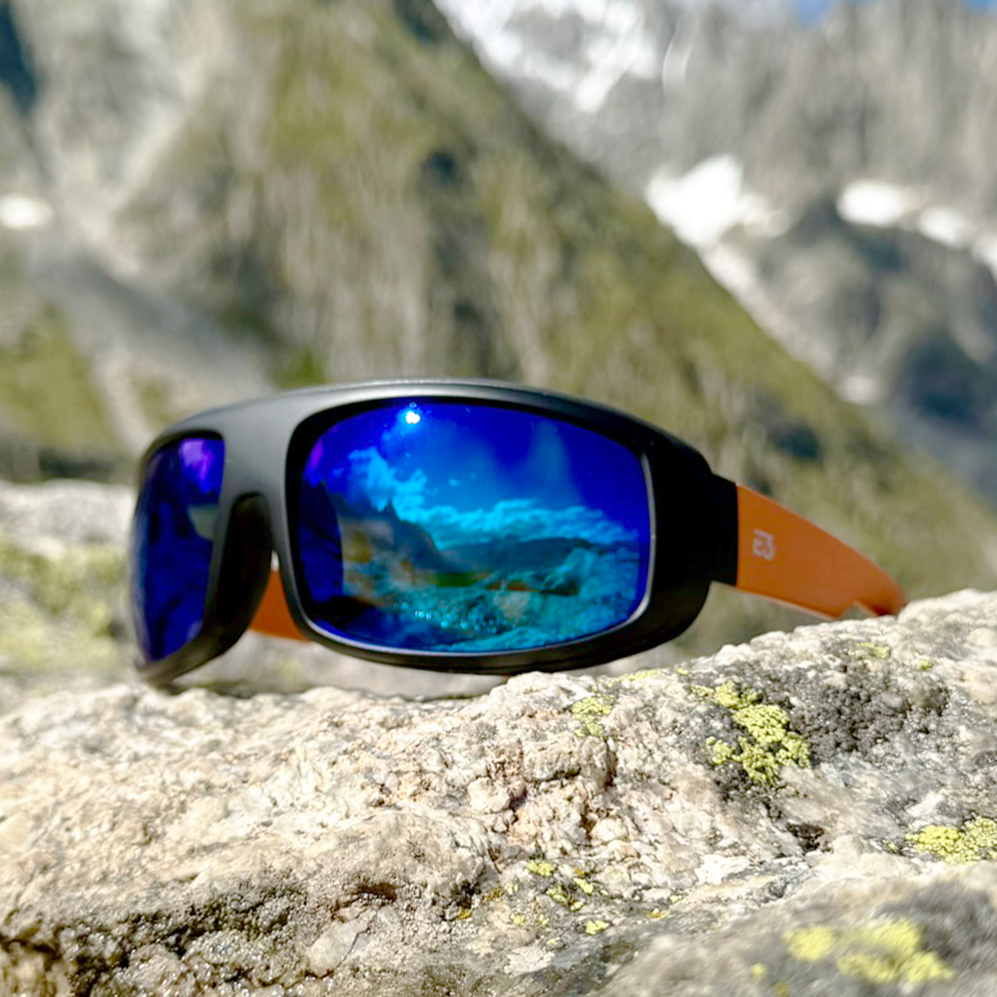 E3 Optics E15 polarized sunglasses on rock by monte blanc – high-performance outdoor eyewear.