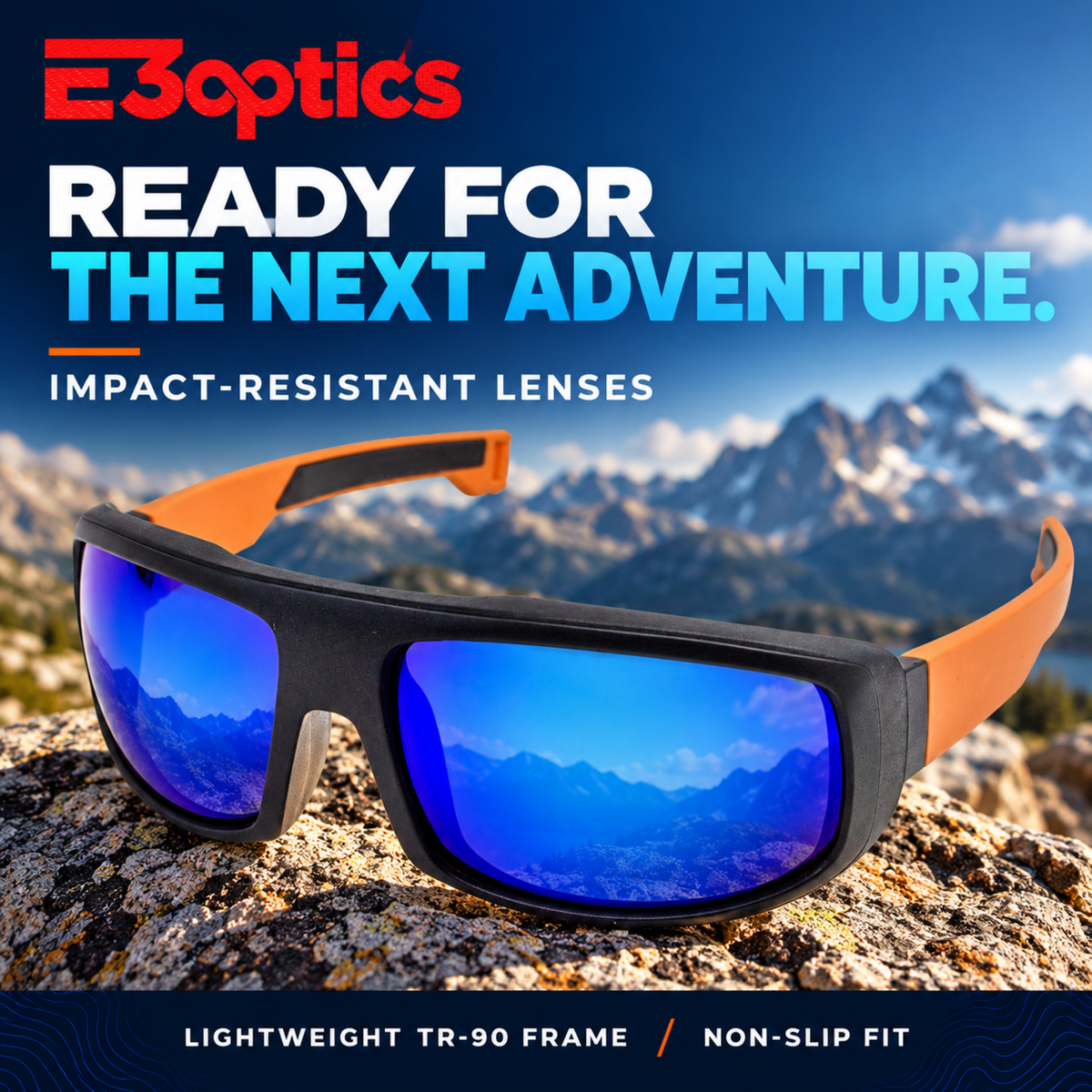E3optics impact-resistant sunglasses with a black TR-90 frame, orange temple tips, and blue mirrored lenses, resting on a rocky mountain surface with a scenic mountain background.