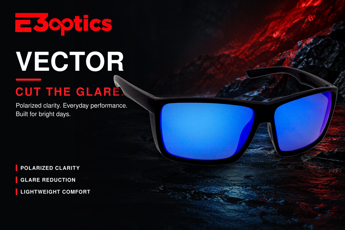 E3optics Vector sunglasses with black frames and vibrant blue mirrored lenses, set against a dark, dramatic background with red and black lighting and product feature text.